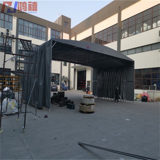 张浦伸缩型帆布雨棚-昆山万向轮推拉钢架雨棚厂家