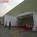 常熟物料移動(dòng)式鋼架伸縮雨棚,鋼管架帶車輪推拉雨棚門(mén)店