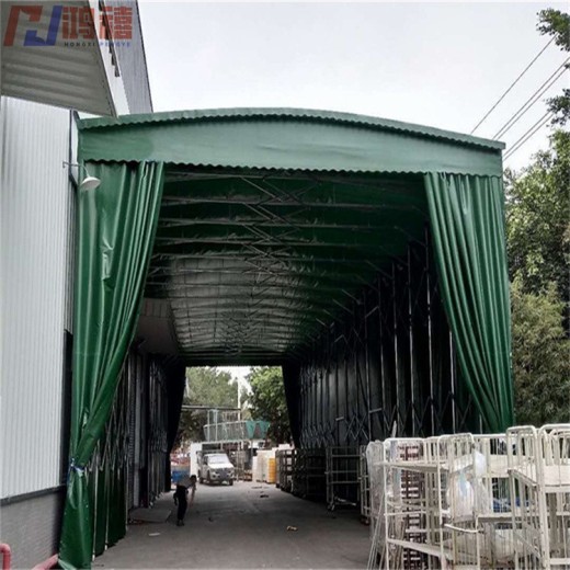 上海镀锌管带轮推拉式雨棚,物料移动式钢架伸缩雨棚造价