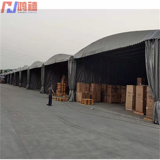 上海物料移动式钢架伸缩雨棚,钢管架带车轮推拉雨棚厂商