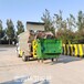電動(dòng)垃圾清運(yùn)汽車?yán)诸愡\(yùn)輸車