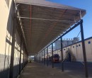 鹤岗钢立柱悬空电动棚,货箱仓库活动雨棚图片