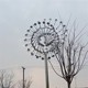 不銹鋼風(fēng)車(chē)雕塑小品圖