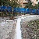 連云港市泰科磨石坐凳現(xiàn)場批筑，真石麗泰科石白色花壇預制安裝