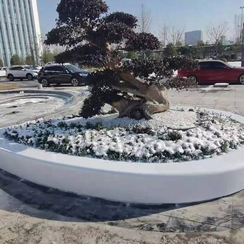 肇慶市市政工程真石麗泰科石橢圓形花壇與樹池式坐凳澆筑技術(shù)