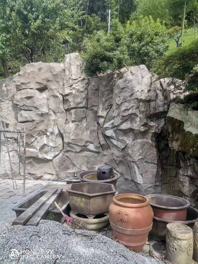 大理仿大門塑石假山施工隊(duì),大理水泥假山批發(fā)市場,假山噴泉