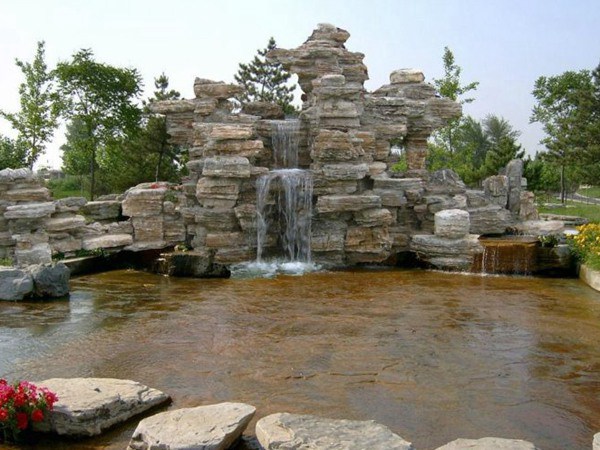 定陶塑石假山厂家千层石假山出售主题公园塑石批发设计