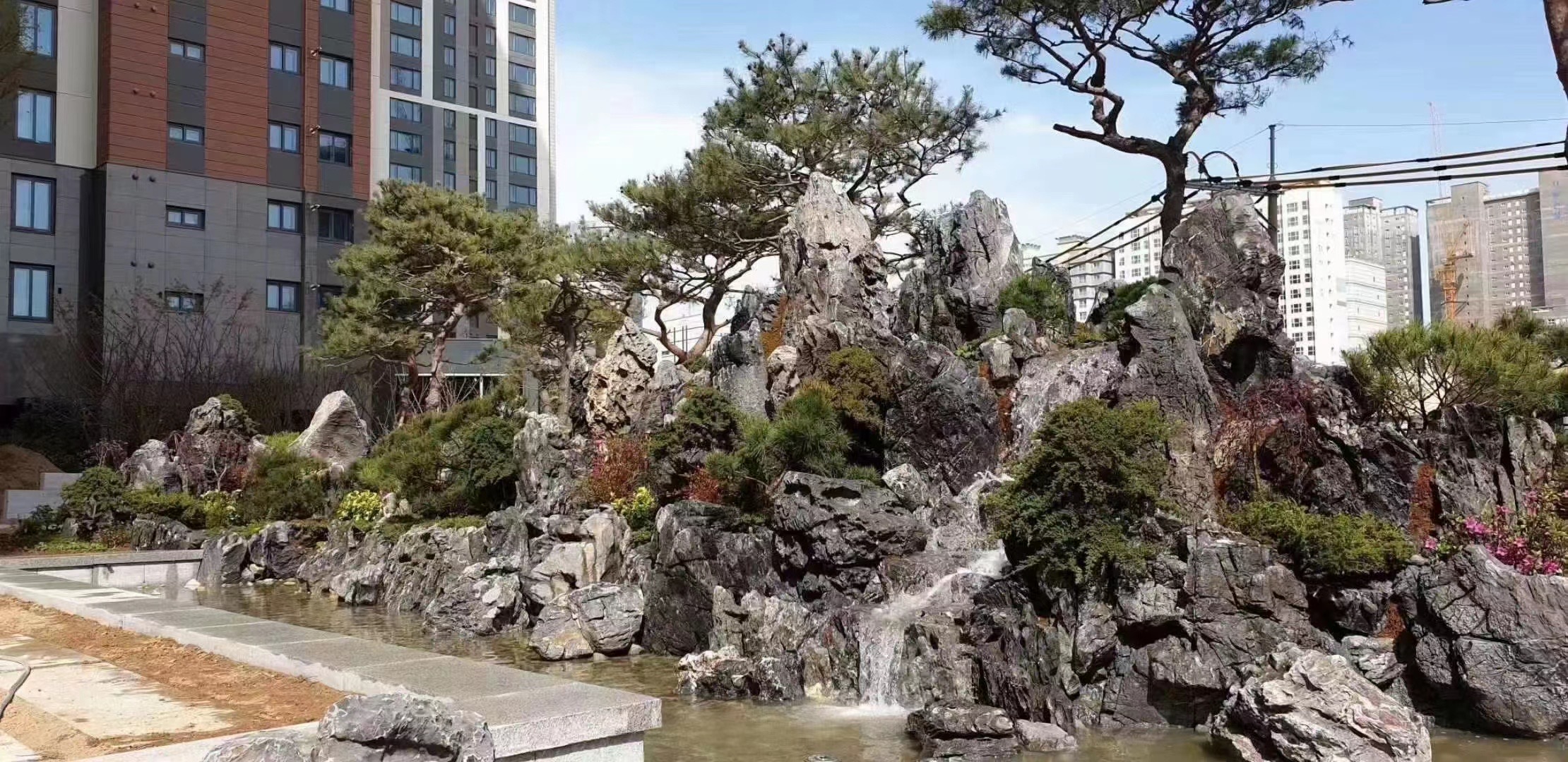 河北裕华区假山厂家自然石假山假山石材批发水泥假山