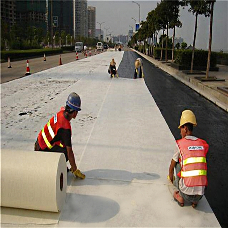 辽宁葫芦岛路面裂缝自粘式聚酯玻纤布厂家加筋土工布